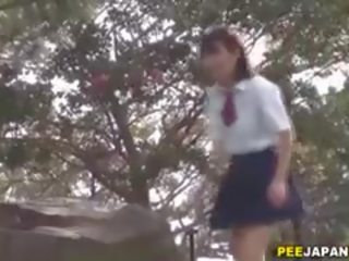 Asiatisk skolejenter tinklin