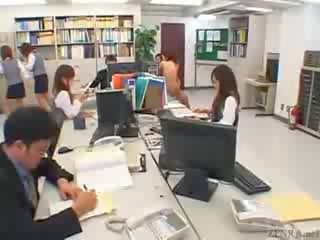 Japanese couple fucks in the middle of an office